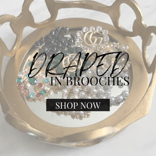 Draped in Luxury Brooches